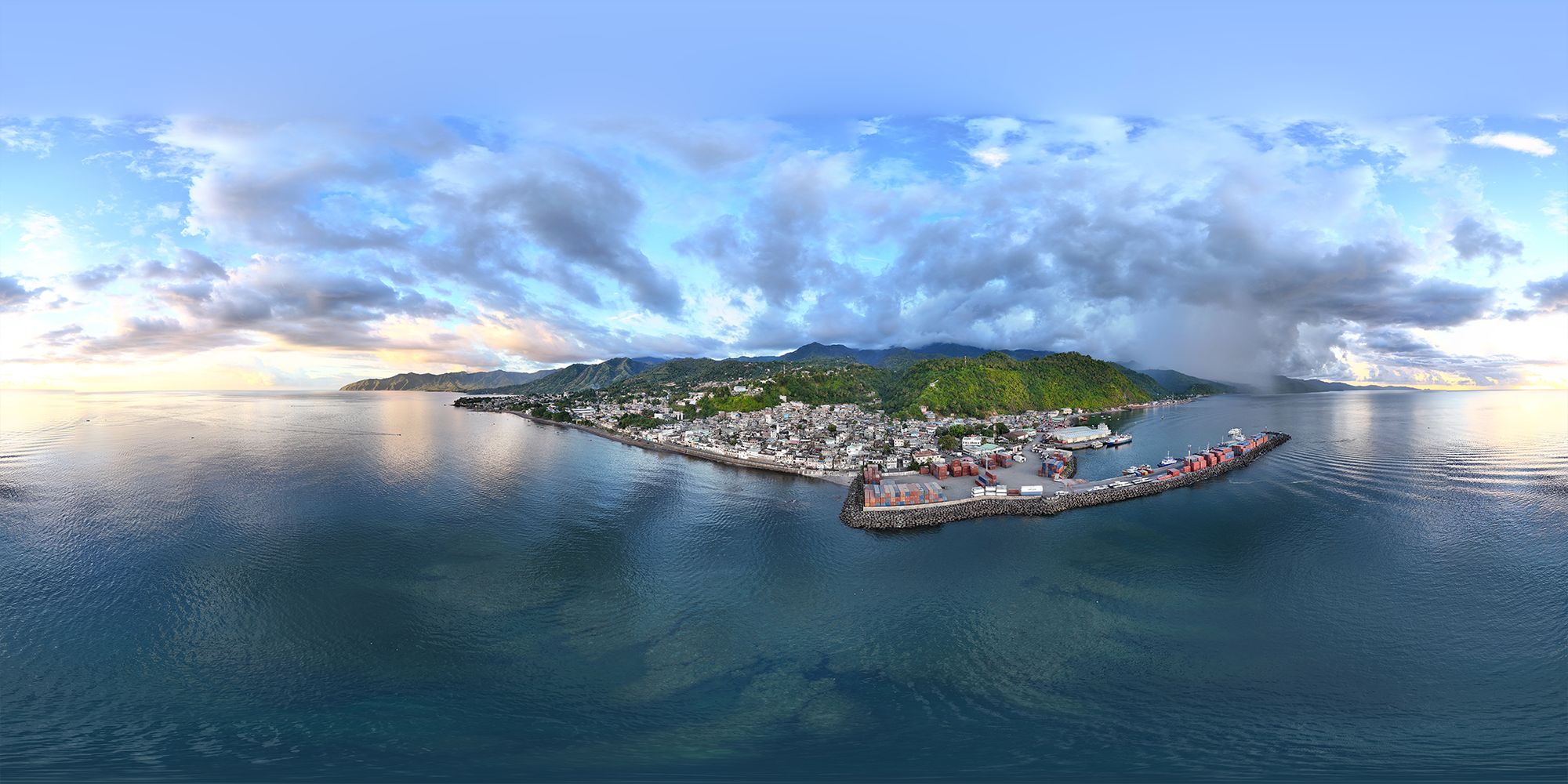 Panoramic aerial view of a coastal town in Madagascar, by Dagoskyline