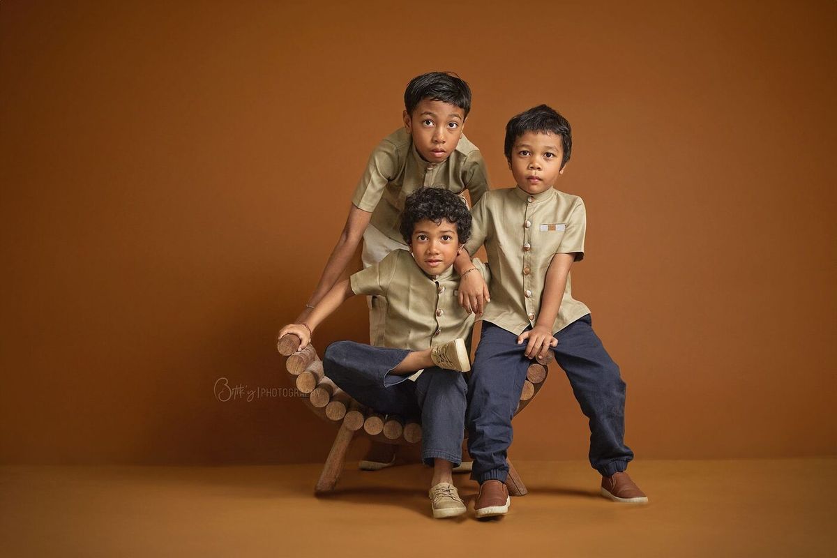 Portrait of three children in the studio